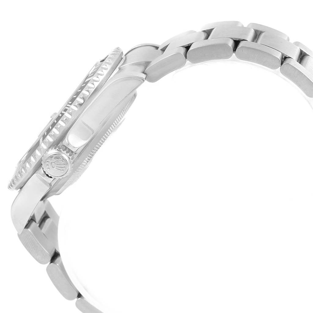 The image shows a side view of the Rolex Submariner 16610 Men's Stainless Steel Black Dial 16610 Men's Stainless Steel Black Dial, highlighting the crown, bezel, and part of the bracelet.