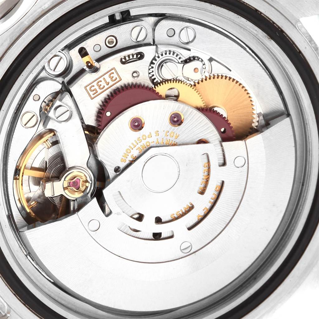 This image shows the internal movement mechanism of a Rolex Submariner 16610 Men's Stainless Steel Black Dial 16610 Men's Stainless Steel Black Dial watch from a close-up, top-down angle.