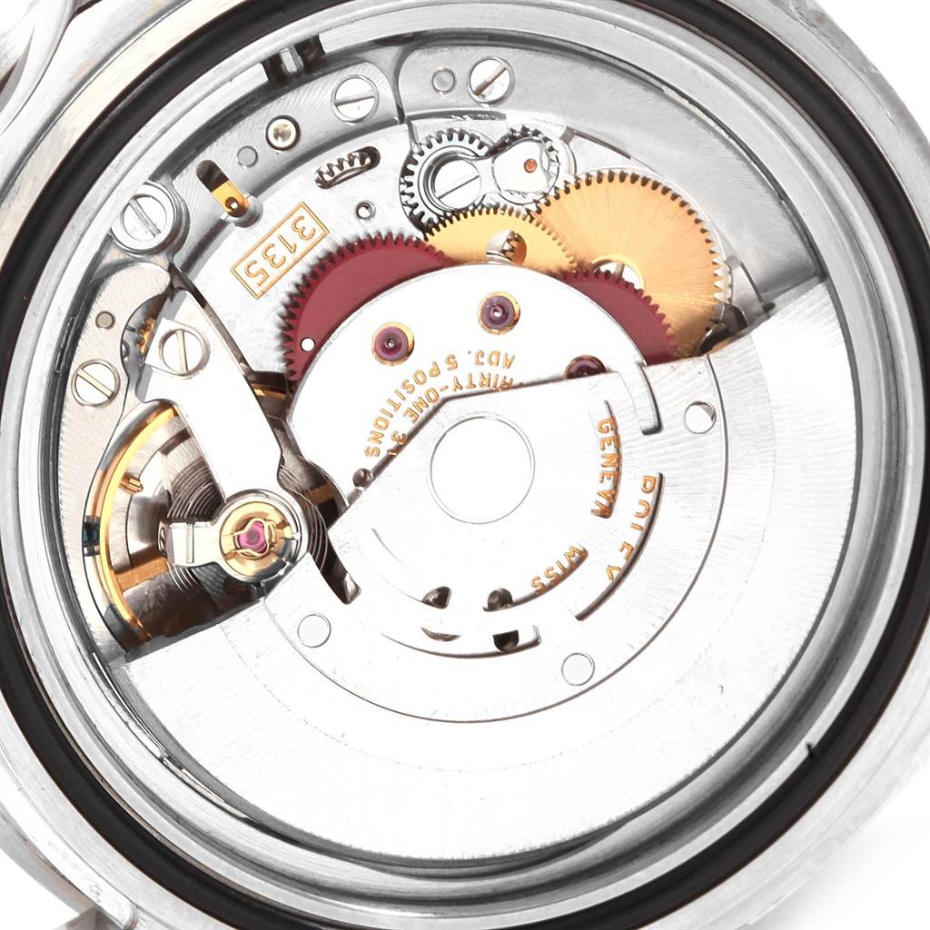 This image shows the intricate inner mechanism of a Rolex Submariner 16610 Men's Stainless Steel Black Dial 16610 Men's Stainless Steel Black Dial watch viewed from the back.