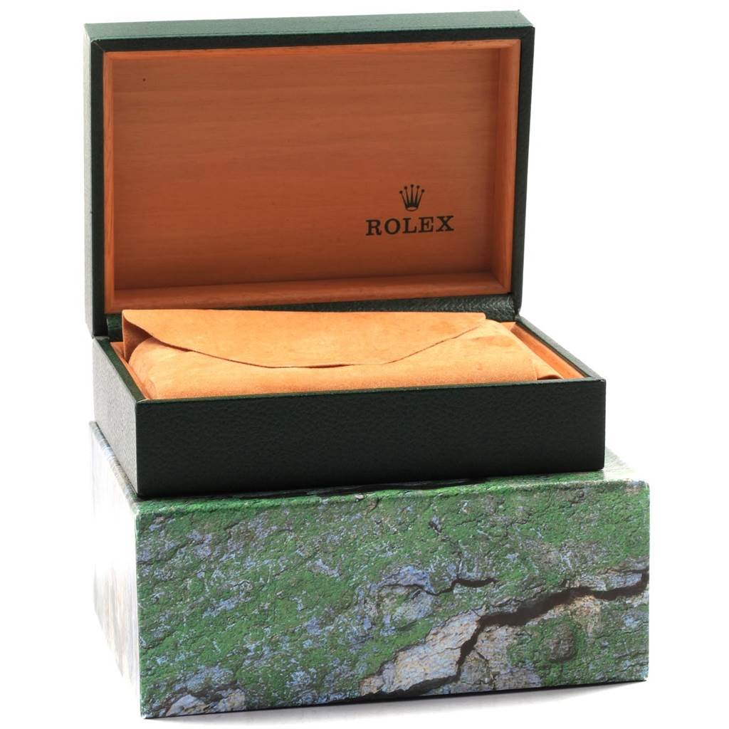 The image shows an opened Rolex Submariner 16610 Men's Stainless Steel Black Dial 16610 Men's Stainless Steel Black Dial watch box with a brown cloth pouch inside.