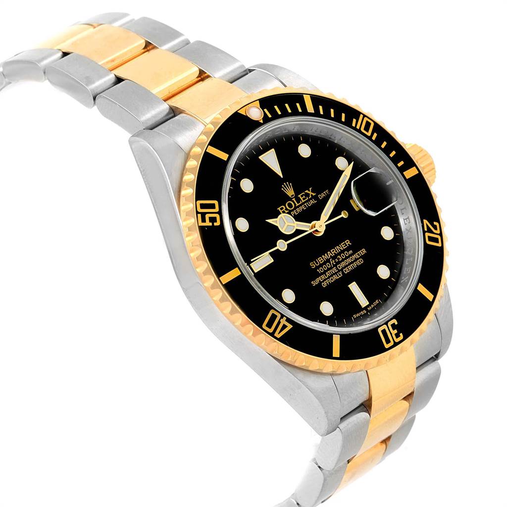 This Rolex Submariner 16613 Men's Steel and Gold (two tone) Black Dial 16613 Men's Steel and Gold (two tone) Black Dial watch is shown from a slightly tilted angle, highlighting its face, bezel, and two-tone bracelet.