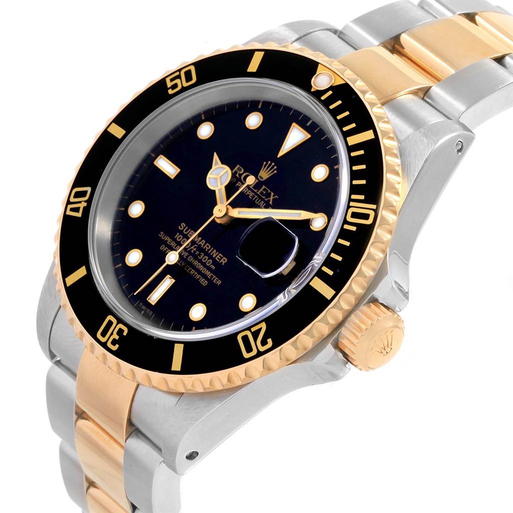 The image shows a Rolex Submariner 16613 Men's Steel and Gold (two tone) Black Dial 16613 Men's Steel and Gold (two tone) Black Dial watch at a slight angle, highlighting its bezel, dial, crown, and part of the bracelet.