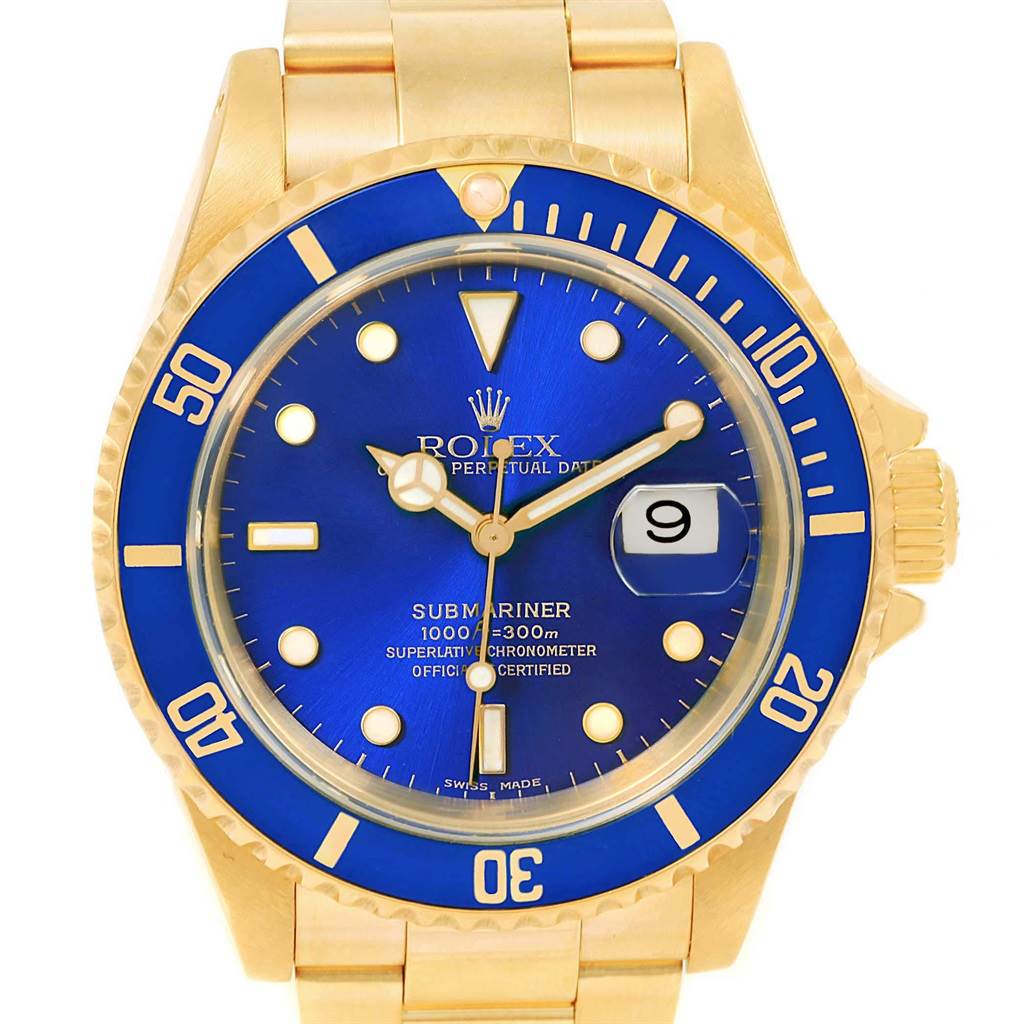 The image shows a frontal view of a Rolex Submariner 16618 Men's Yellow Gold Blue Dial 16618 Men's Yellow Gold Blue Dial watch with a blue dial and gold bracelet.