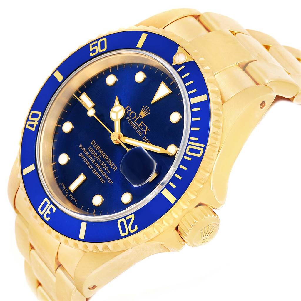 The image shows a side view of a Rolex Submariner 16618 Men's Yellow Gold Blue Dial 16618 Men's Yellow Gold Blue Dial watch, highlighting the blue dial and bezel, gold case, and bracelet.