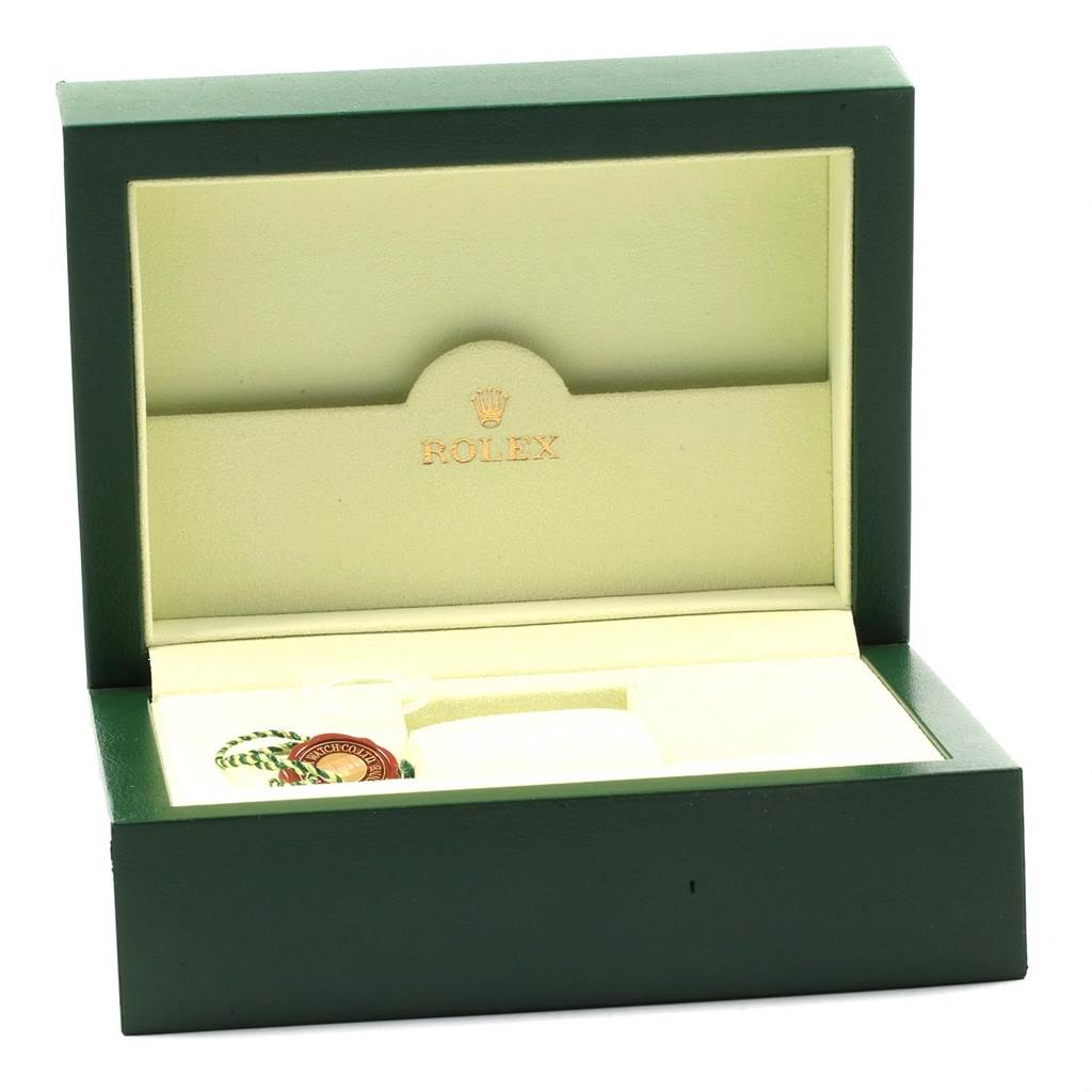 The image shows an open green Rolex box angled slightly from the front displaying the interior meant for a Submariner model.