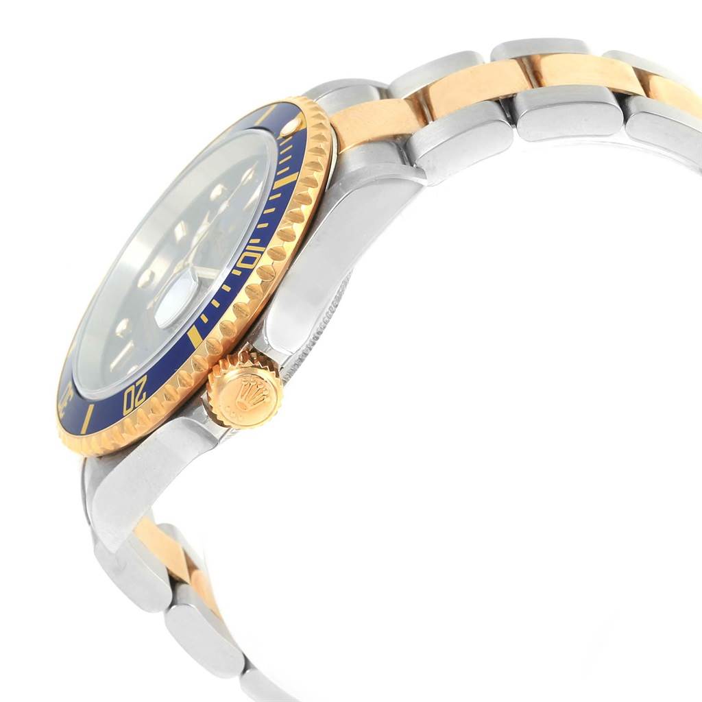 The image shows a side view of the Rolex Submariner 16613 Men's Steel and Gold (two tone) Blue Dial 16613 Men's Steel and Gold (two tone) Blue Dial, displaying the crown, bezel, and part of the bracelet.