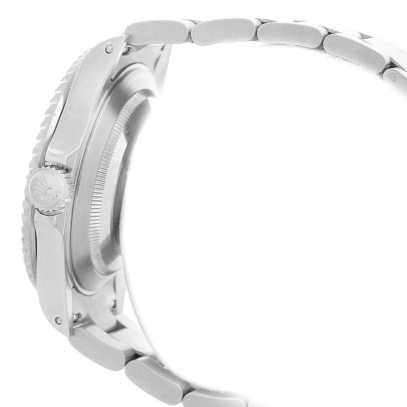 The image shows a side angle of the Rolex Submariner 16610 Men's Stainless Steel Black Dial 16610 Men's Stainless Steel Black Dial, highlighting the crown, case, and part of the bracelet.