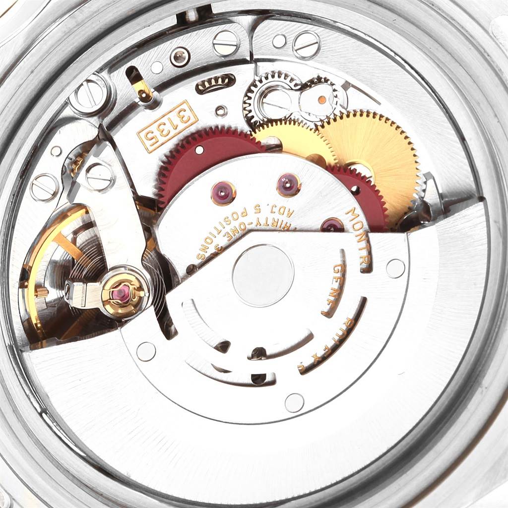 This image shows the movement and inner mechanism of the Rolex Submariner 16610 Men's Stainless Steel Black Dial 16610 Men's Stainless Steel Black Dial watch model.