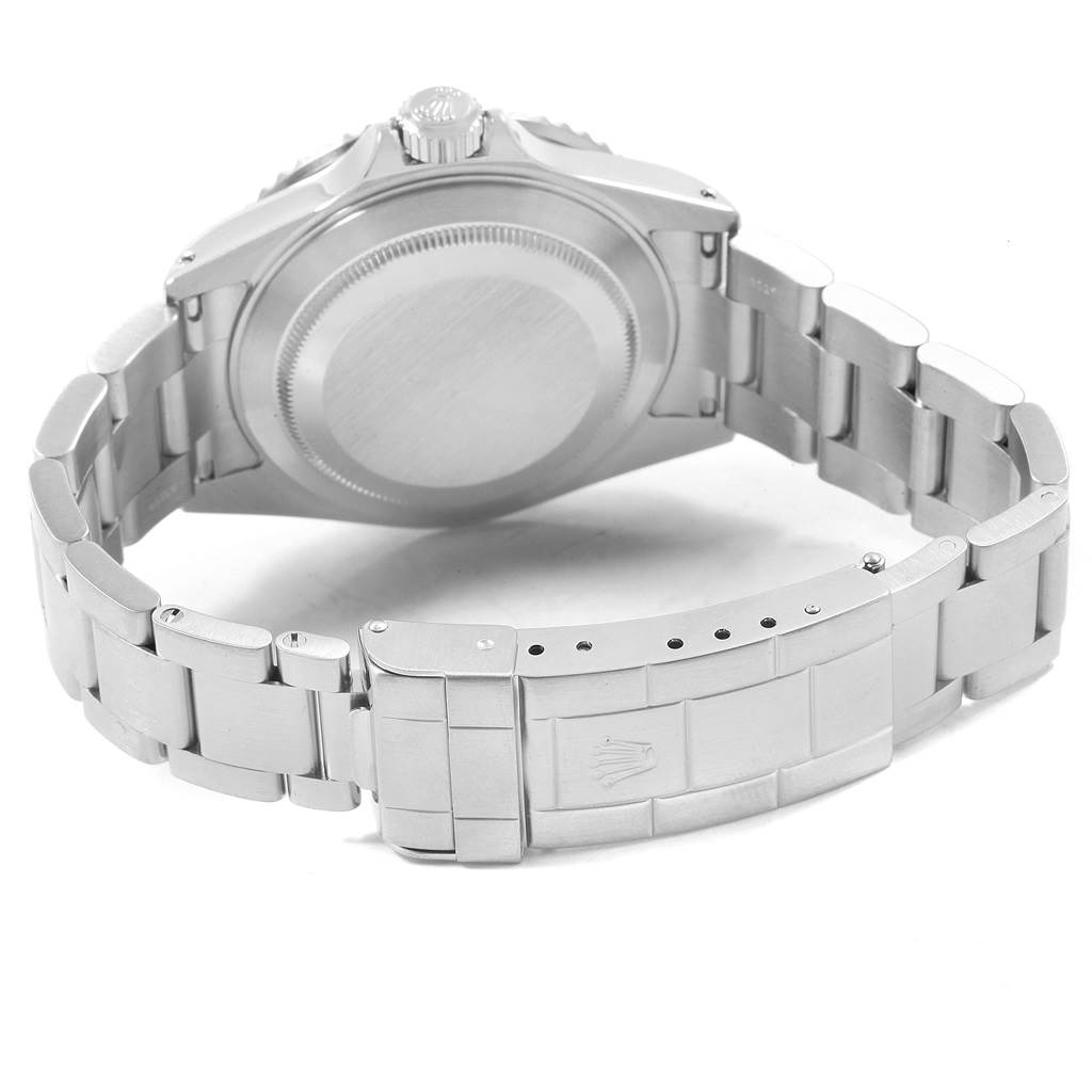 This image shows the backside and bracelet of a Rolex Submariner 16610 Men's Stainless Steel Black Dial 16610 Men's Stainless Steel Black Dial watch, highlighting the clasp and case back.