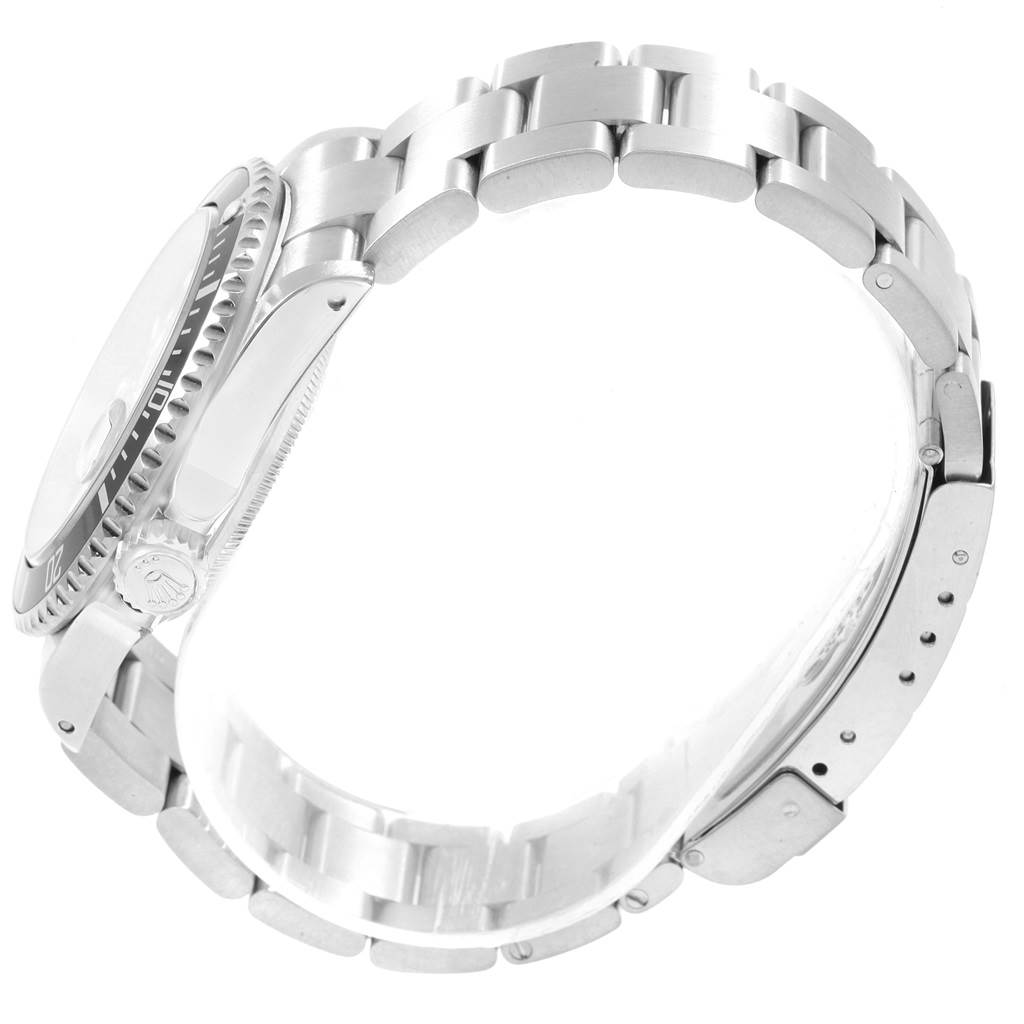 The image shows a side view of a Rolex Submariner 16610 Men's Stainless Steel Black Dial 16610 Men's Stainless Steel Black Dial watch displaying its bracelet, clasp, and side of the case with the crown.