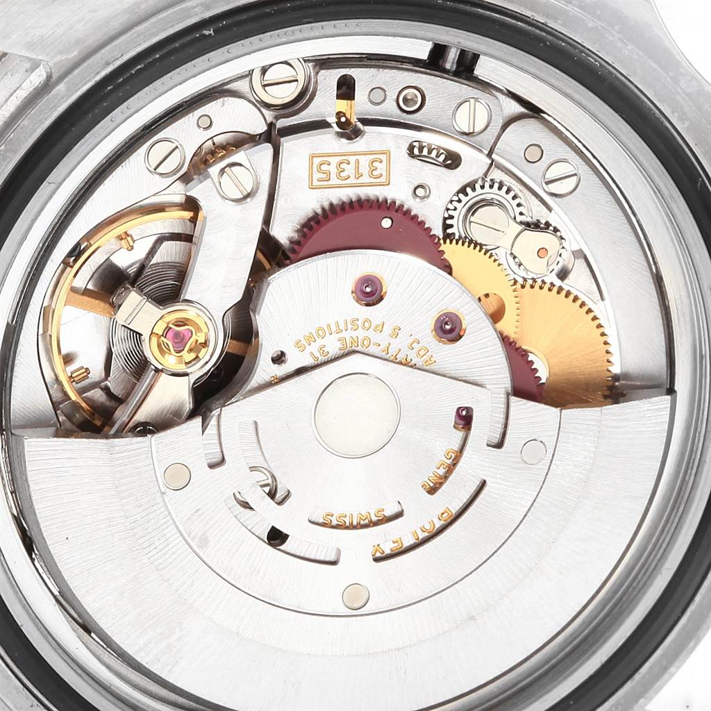 This image shows the inner mechanical movement of a Rolex Submariner 16613 Men's Steel and Gold (two tone) Blue Dial 16613 Men's Steel and Gold (two tone) Blue Dial watch from a direct overhead angle.