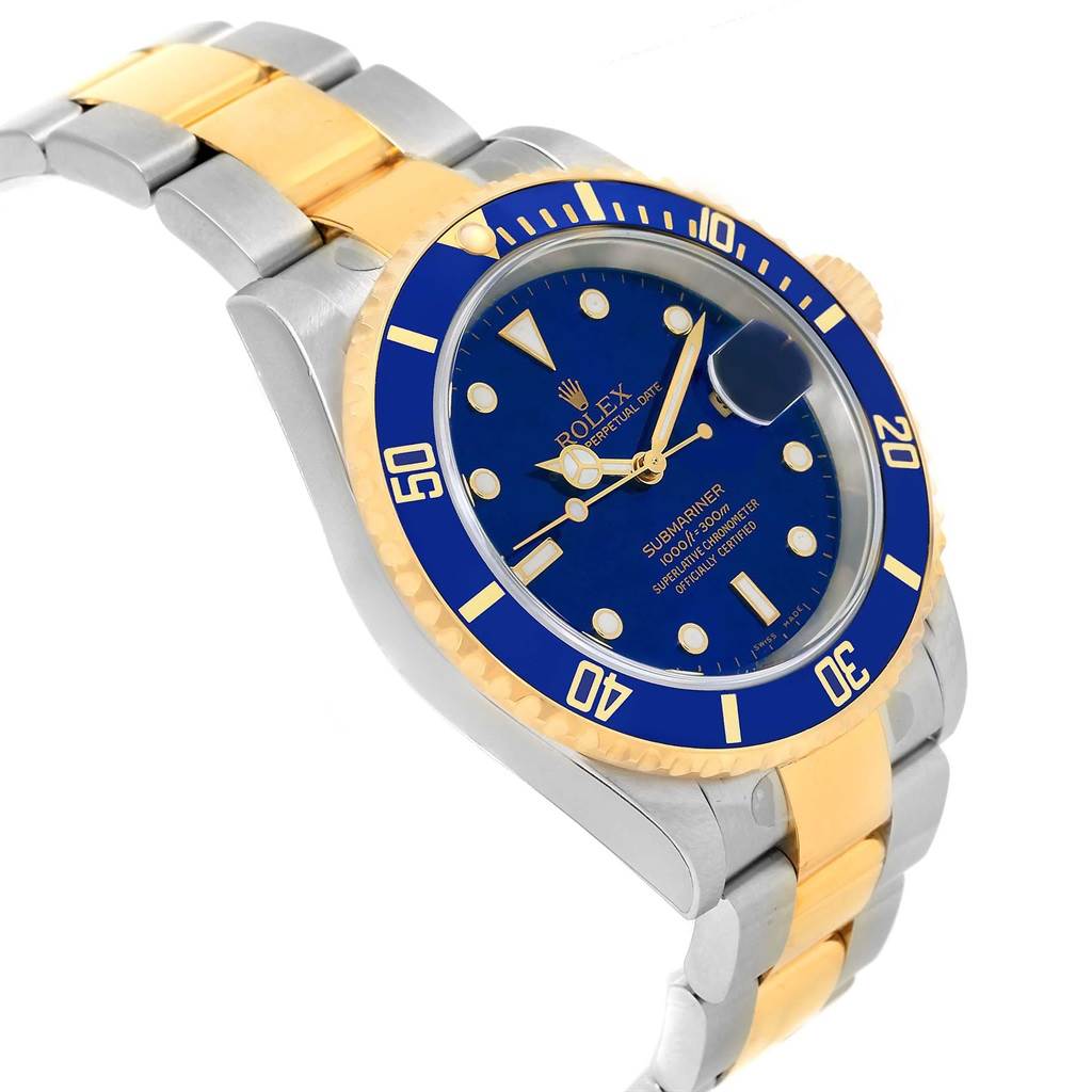 This image shows a Rolex Submariner 16613 Men's Steel and Gold (two tone) Blue Dial 16613 Men's Steel and Gold (two tone) Blue Dial watch at an angle, highlighting its blue bezel and dial, and two-tone metal bracelet.
