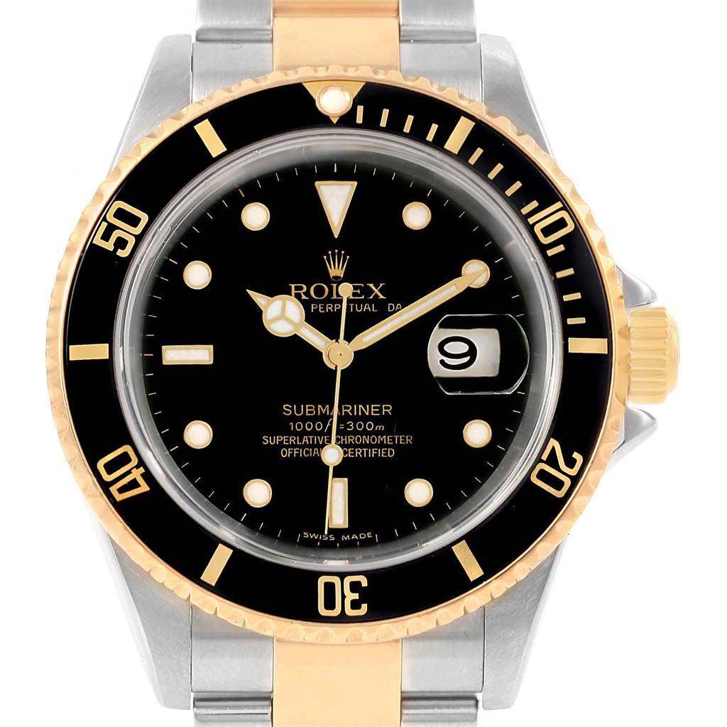 The image shows a front view of a Rolex Submariner 16613 Men's Steel and Gold (two tone) Black Dial 16613 Men's Steel and Gold (two tone) Black Dial watch, highlighting its face, bezel, and two-tone bracelet.