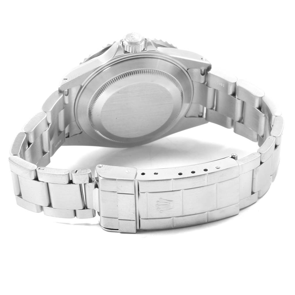 The image shows the case back and bracelet clasp of a Rolex Submariner 16610 Men's Stainless Steel Black Dial 16610 Men's Stainless Steel Black Dial watch from the back angle.