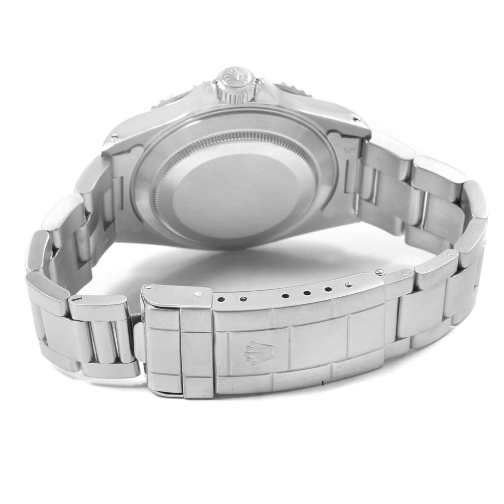 The image shows the back view of a Rolex Submariner 14060 Men's Stainless Steel Black Dial 14060 Men's Stainless Steel Black Dial watch, highlighting its clasp, bracelet, and case back.