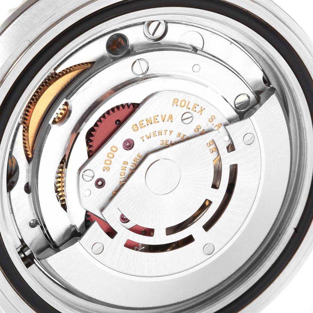 The image shows a close-up view of the movement mechanism of a Rolex Submariner 14060 Men's Stainless Steel Black Dial 14060 Men's Stainless Steel Black Dial watch from the back.