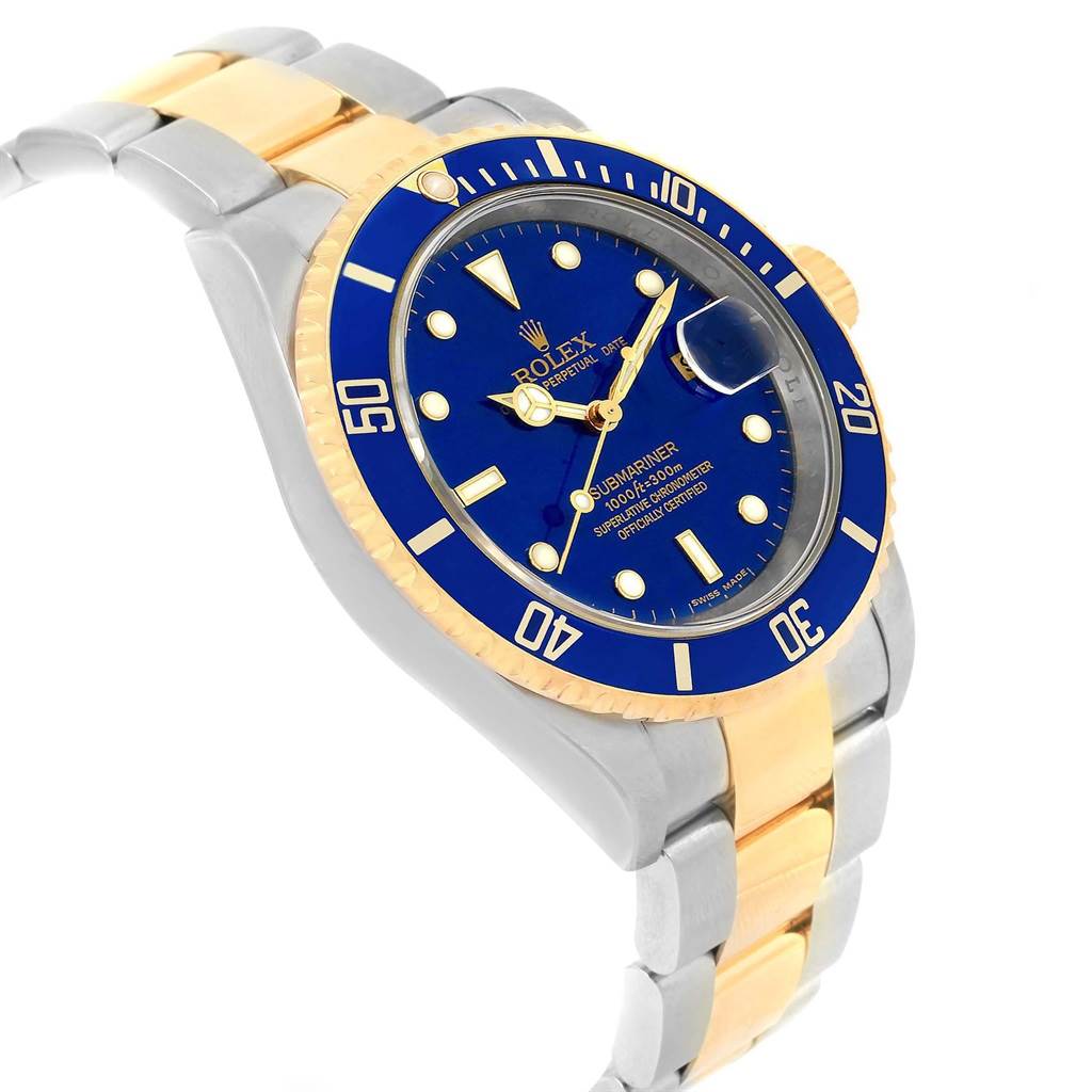 The image shows a Rolex Submariner 16613 Men's Steel and Gold (two tone) Blue Dial 16613 Men's Steel and Gold (two tone) Blue Dial watch at a slight angle, displaying the face, bezel, crown, and part of the bracelet.