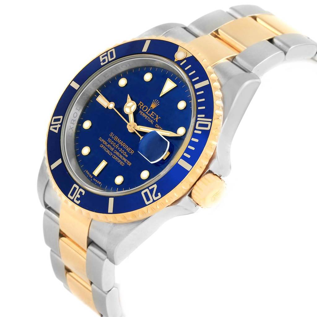 The Rolex Submariner 16613 Men's Steel and Gold (two tone) Blue Dial 16613 Men's Steel and Gold (two tone) Blue Dial watch is shown at a slight angle, displaying its blue dial, bezel, crown, and two-tone bracelet.