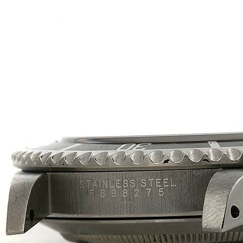 The image shows a close-up side view of the case and bezel of a Rolex Submariner 14060 Men's Stainless Steel Black Dial 14060 Men's Stainless Steel Black Dial watch.