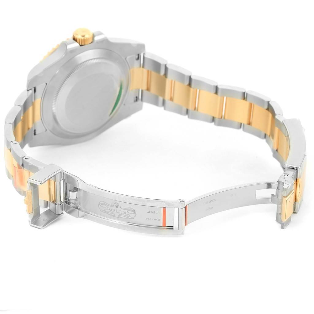 The image shows the back and bracelet of a Rolex Submariner 116613 Men's Steel and Gold (two tone) Blue Dial 116613 Men's Steel and Gold (two tone) Blue Dial watch, highlighting the clasp and two-tone metal design.