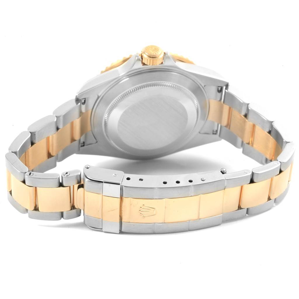 This image shows the back case and bracelet of the Rolex Submariner 16613 Men's Steel and Gold (two tone) Black Dial 16613 Men's Steel and Gold (two tone) Black Dial watch, taken from the rear.