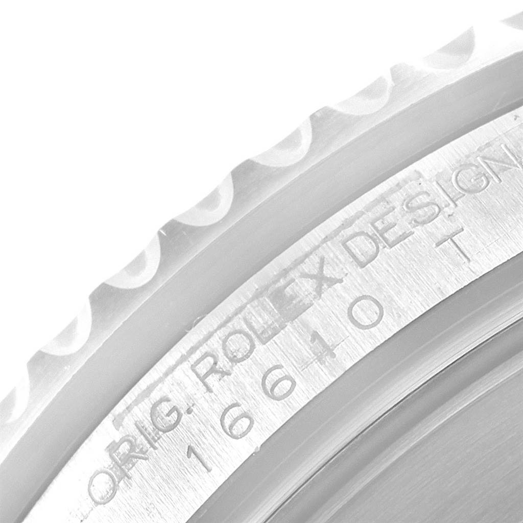 This close-up image shows the engraved bezel and model number "16610T" of a Rolex Submariner 16610 Men's Stainless Steel Black Dial 16610 Men's Stainless Steel Black Dial watch.