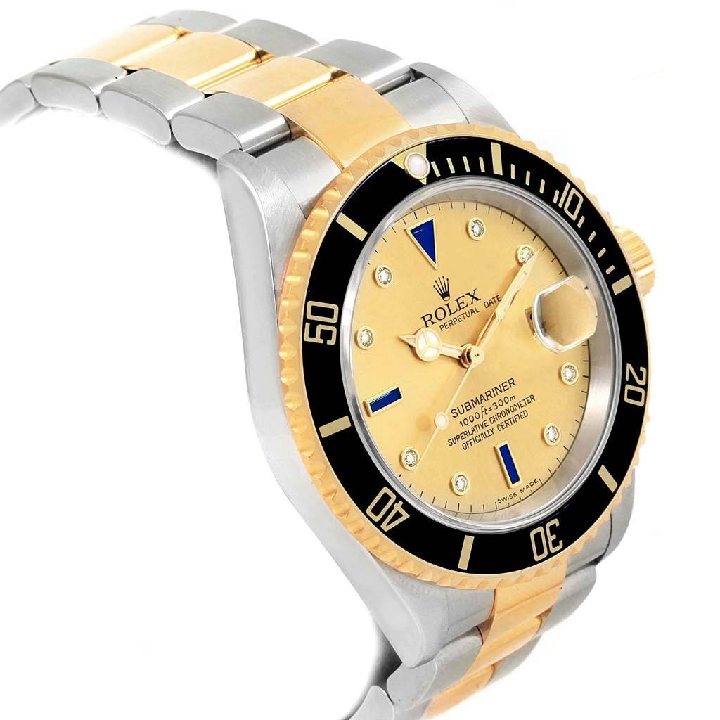 The image shows a side view of the Rolex Submariner 16613 Men's Steel and Gold (two tone) Champagne Dial 16613 Men's Steel and Gold (two tone) Champagne Dial watch, highlighting its bezel, dial, and two-tone metal bracelet.