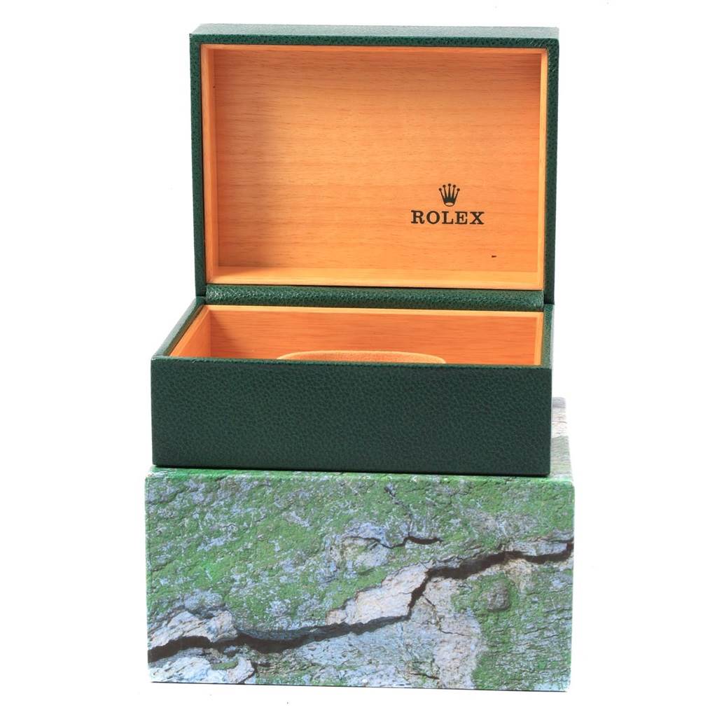 The image shows an open green and wood watch box for the Rolex Submariner 16610 Men's Stainless Steel Black Dial 16610 Men's Stainless Steel Black Dial model.