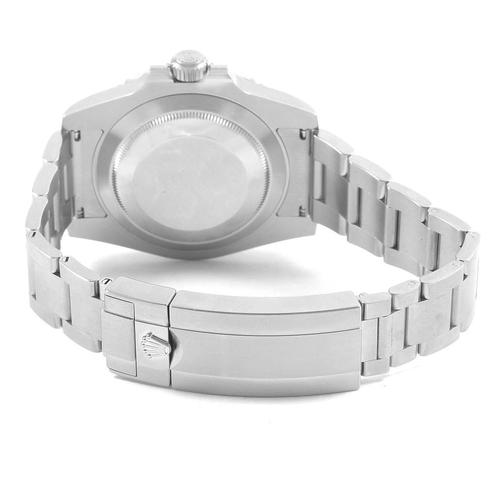 The image shows the backside of a Rolex Submariner 116610LV Men
s Stainless Steel Green Dial 116610LV Men
s Stainless Steel Green Dial, showcasing its case back, bracelet, and clasp.