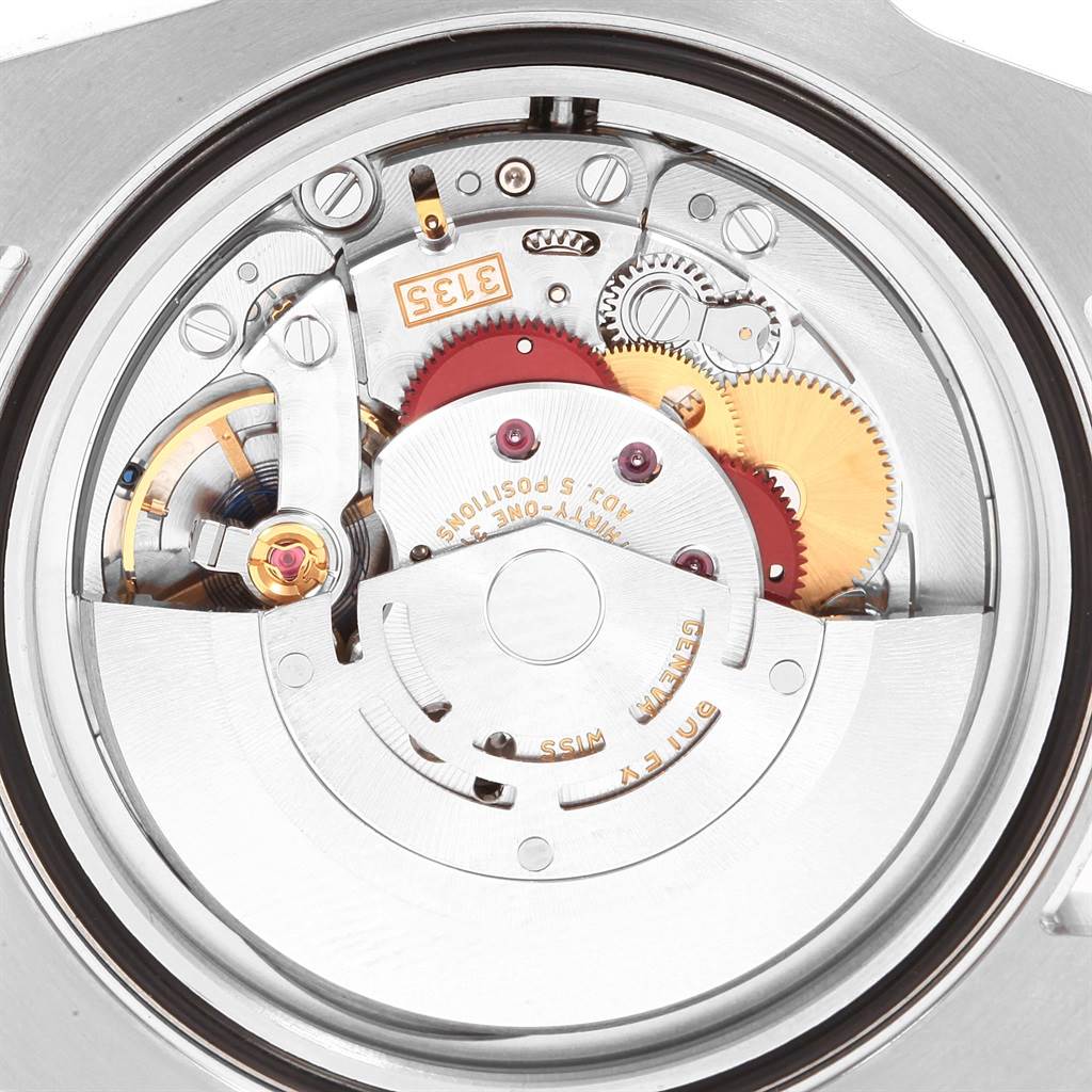 This image shows a detailed view of the movement mechanism of a Rolex Submariner 116610LV Men
s Stainless Steel Green Dial 116610LV Men
s Stainless Steel Green Dial watch.