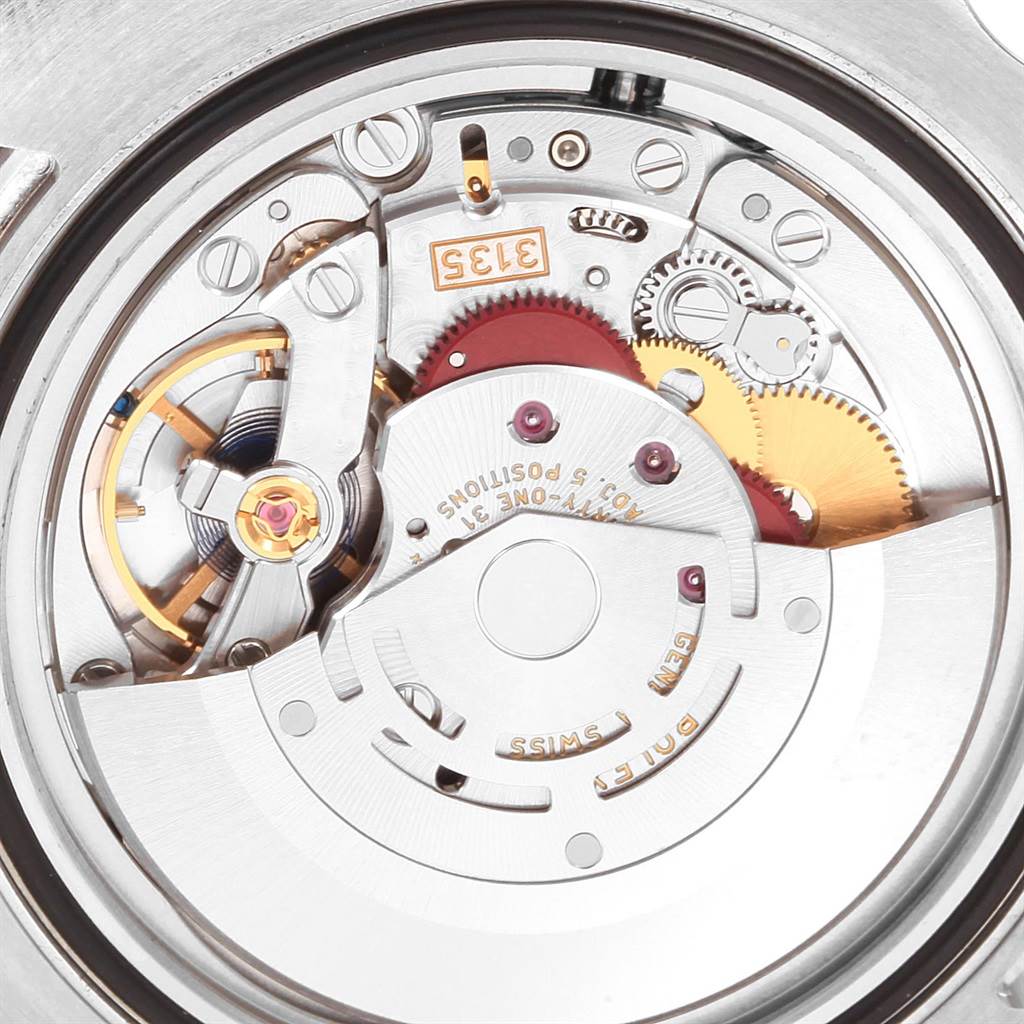 This image shows a close-up of the internal mechanical movement of a Rolex Submariner 116610LV Men
s Stainless Steel Green Dial 116610LV Men
s Stainless Steel Green Dial watch.