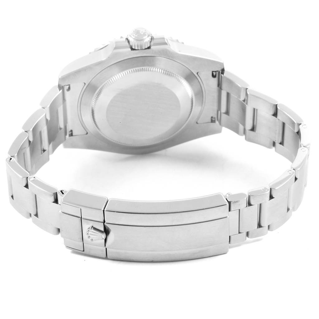 The image shows the backside of a Rolex Submariner 116610LV Men
s Stainless Steel Green Dial 116610LV Men
s Stainless Steel Green Dial watch, highlighting the case back and bracelet with the clasp.