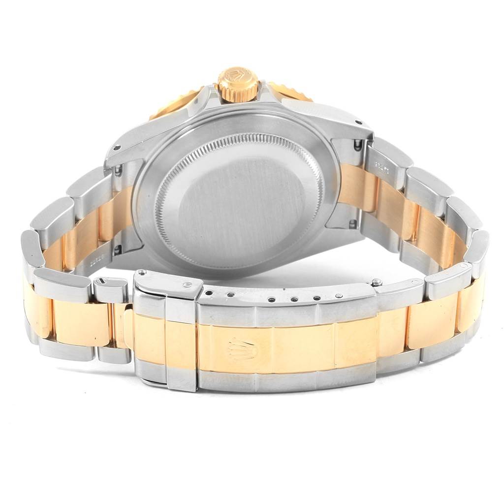 This image shows the back view of a Rolex Submariner 16613 Men's Steel and Gold (two tone) Blue Dial 16613 Men's Steel and Gold (two tone) Blue Dial watch, focusing on the case back, crown, and bracelet.