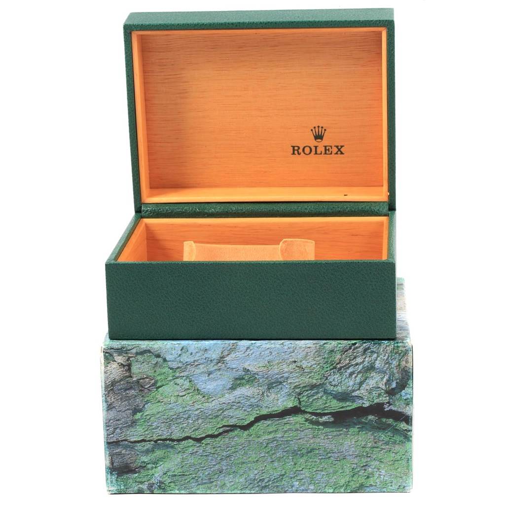 The image shows an open Rolex Submariner 16613 Men's Steel and Gold (two tone) Blue Dial 16613 Men's Steel and Gold (two tone) Blue Dial watch box and its outer packaging from a front angle.