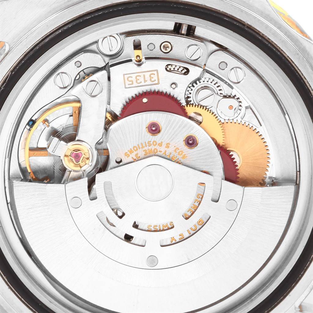 This image shows the internal mechanical movement of a Rolex Submariner 16613 Men's Steel and Gold (two tone) Black Dial 16613 Men's Steel and Gold (two tone) Black Dial watch viewed from the back.