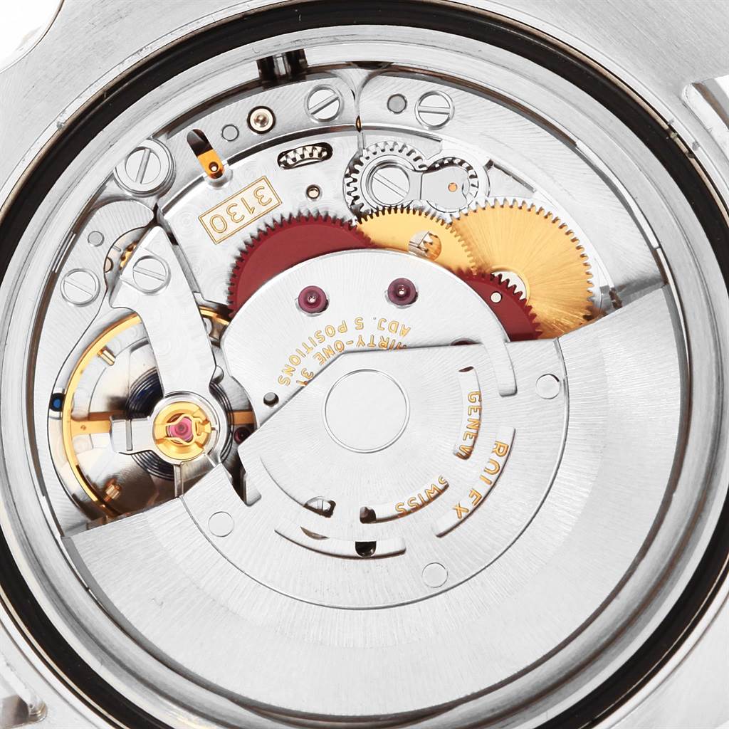 This image shows a close-up view of the movement mechanism inside a Rolex Submariner 114060 Men's Stainless Steel Black Dial 114060 Men's Stainless Steel Black Dial watch.