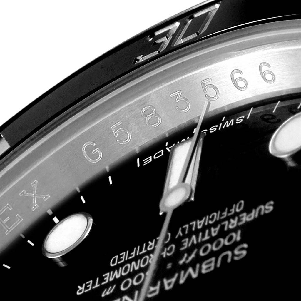 The image shows a close-up of the face, bezel, and partially visible hands and dial of a Rolex Submariner 114060 Men's Stainless Steel Black Dial 114060 Men's Stainless Steel Black Dial watch.
