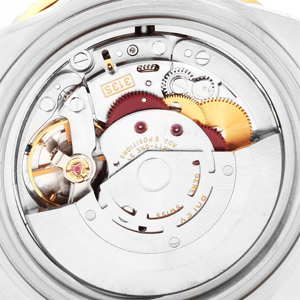 The image shows an internal view of the Rolex Submariner 16613 Men's Steel and Gold (two tone) Grey Dial 16613 Men's Steel and Gold (two tone) Grey Dial model watch, detailing its movement components.