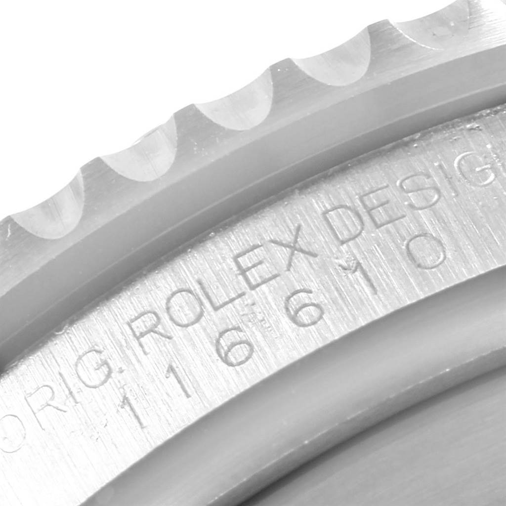 The image shows a close-up of the bezel and case side engraving on a Rolex Submariner 116610LV Men's Stainless Steel Green Dial 116610LV Men's Stainless Steel Green Dial watch.