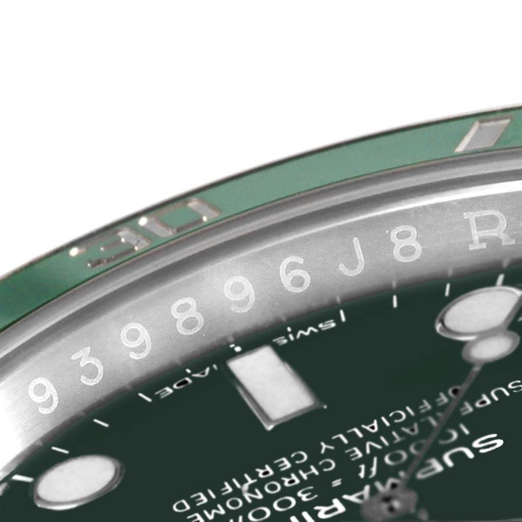 The image shows a close-up of the bezel, serial number, and part of the dial of a Rolex Submariner 116610LV Men's Stainless Steel Green Dial 116610LV Men's Stainless Steel Green Dial watch.