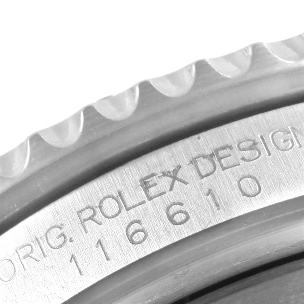 A close-up angle of the Rolex Submariner 116610 Men's Stainless Steel Black Dial 116610 Men's Stainless Steel Black Dial showing its serrated bezel and engraved inner ring with model number 116610.