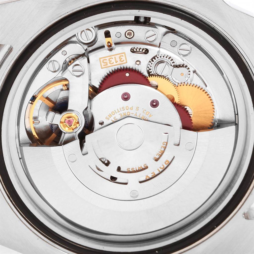 The image shows the intricate internal movement mechanism of a Rolex Submariner 116610 Men's Stainless Steel Black Dial 116610 Men's Stainless Steel Black Dial watch.