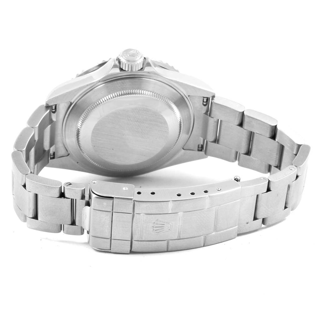 This image shows the back and bracelet clasp of a Rolex Submariner 16610LV Men
s Stainless Steel Black Dial 16610LV Men
s Stainless Steel Black Dial watch with a deployment clasp.