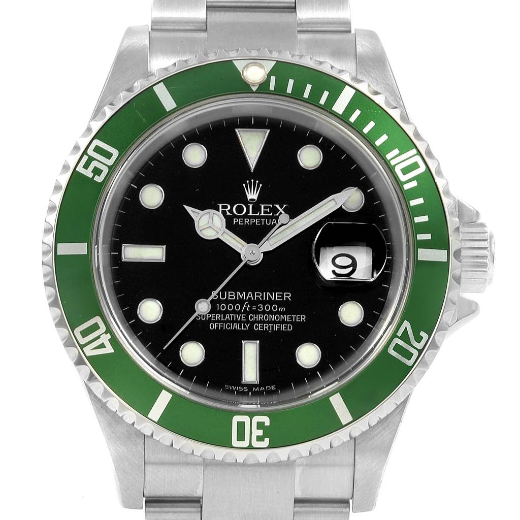 The image shows a frontal view of a Rolex Submariner 16610LV Men
s Stainless Steel Black Dial 16610LV Men
s Stainless Steel Black Dial watch, highlighting its green bezel, black dial, and stainless steel bracelet.