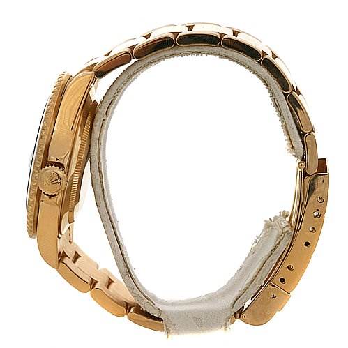 This side view shows the bracelet and case of a Rolex Submariner 16618 Men's Yellow Gold Champagne Dial 16618 Men's Yellow Gold Champagne Dial watch.