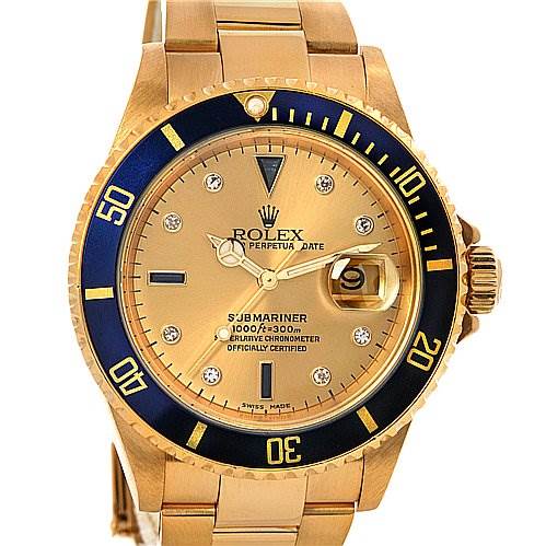 The image shows a frontal view of a Rolex Submariner 16618 Men's Yellow Gold Champagne Dial 16618 Men's Yellow Gold Champagne Dial watch, displaying the dial, bezel, and part of the bracelet.