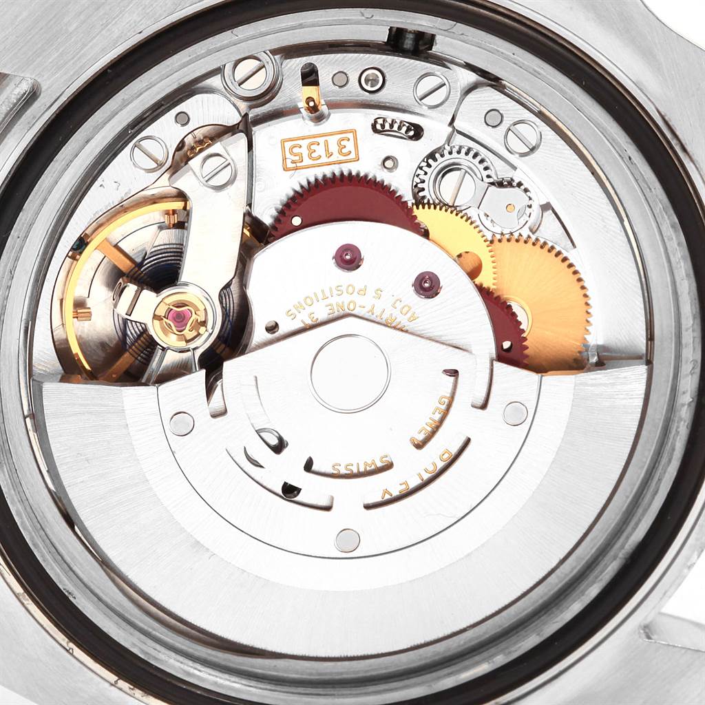 This image shows the internal mechanical movement of a Rolex Submariner 116610 Men's Stainless Steel Black Dial 116610 Men's Stainless Steel Black Dial watch from a top-down angle.