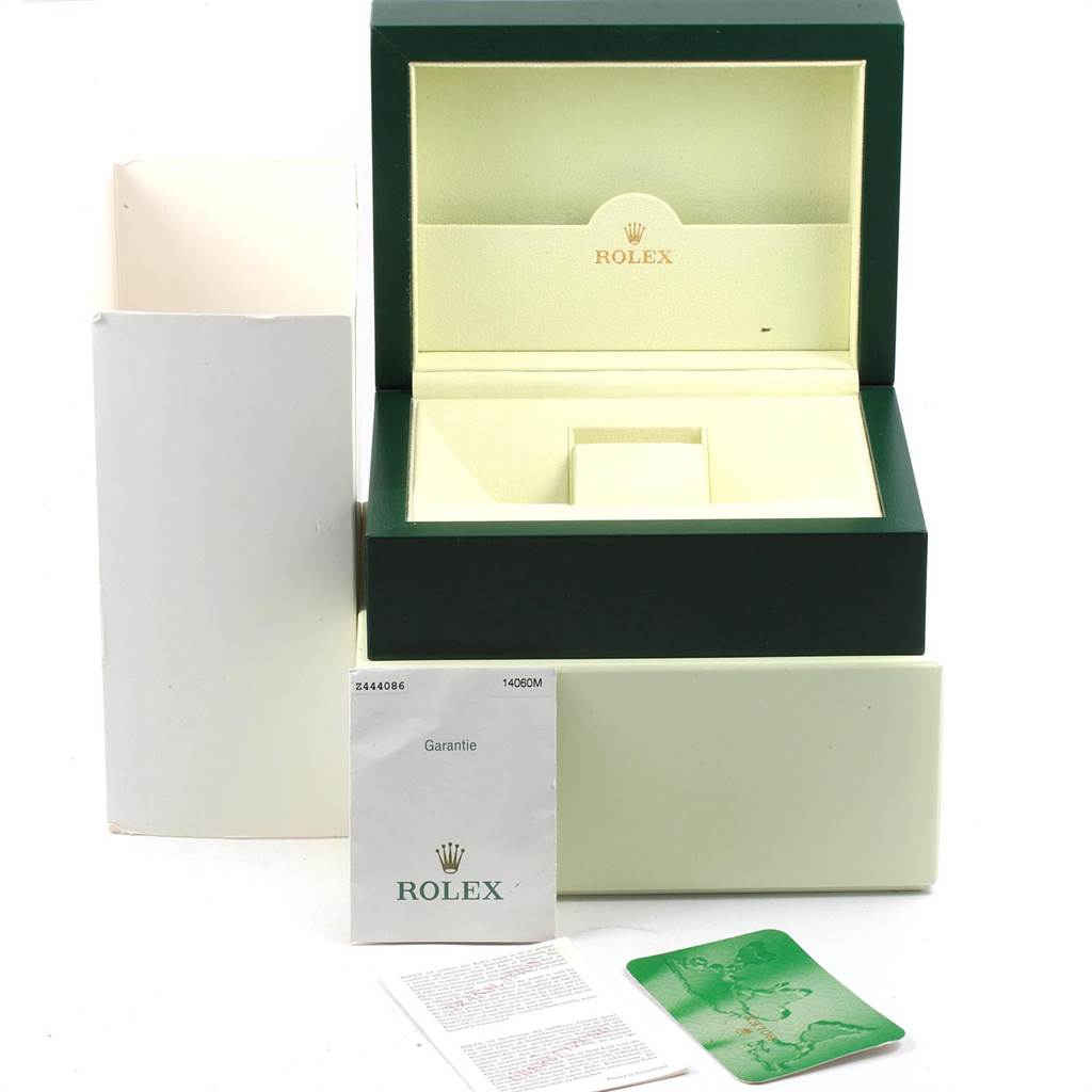 The image shows the box, warranty card, and documents for a Rolex Submariner 14060 Men's Stainless Steel Black Dial 14060 Men's Stainless Steel Black Dial watch.