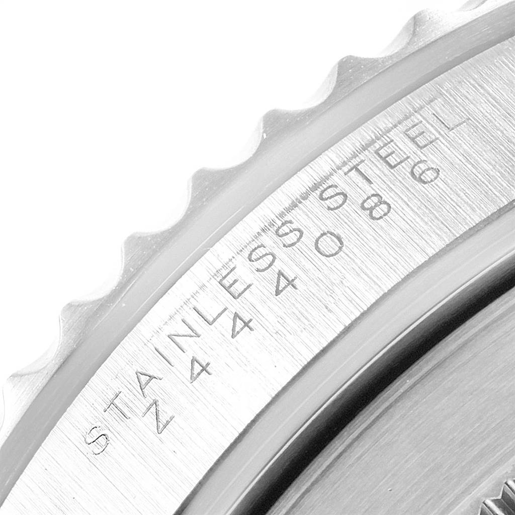 The image shows a close-up angle of the bezel and serial number engraving on a Rolex Submariner 14060 Men's Stainless Steel Black Dial 14060 Men's Stainless Steel Black Dial model.