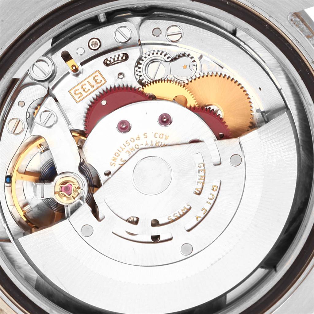 This image shows the inner mechanical movement parts of a Rolex Submariner 116619BLSO Men's White Gold Blue Dial 116619BLSO Men's White Gold Blue Dial watch from a close-up angle.